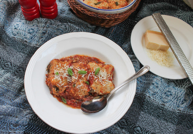 Food Lust People Love: These cheesy eggplant pork roast rolls are filled with pork, eggplant and mozzarella, baked in a fresh garlicky tomato sauce, then topped with more cheese.