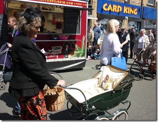 8 costumed 40s lady and pram