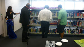 Librarians and staff from the Pacific Centre browsing the new Pacific Collection.