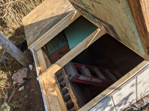 open hatch to a well pit