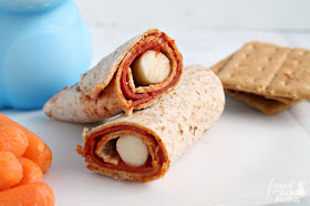 These quick & tasty Lunchbox Pizza Rollups are not only kid approved, but they also get the mom seal of approval for being healthy & filling too.