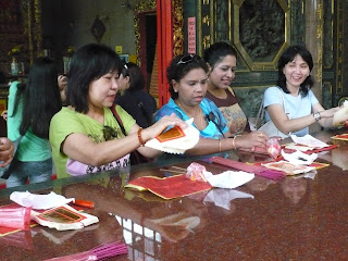 Indian and Chinese folding incense paper together