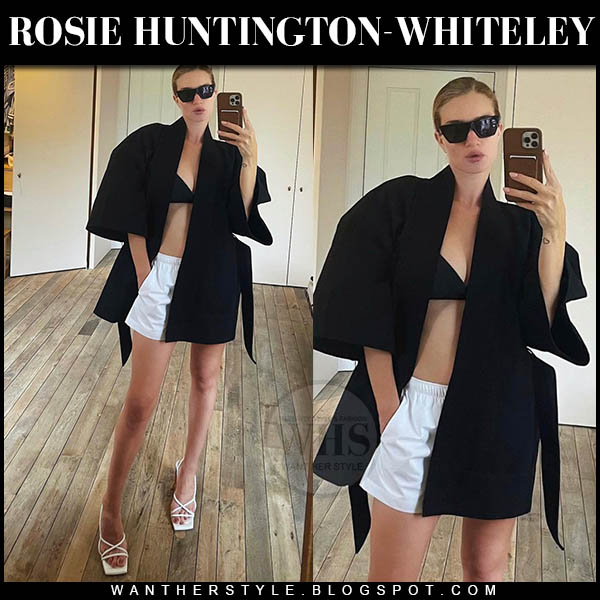 Rosie Huntington-Whiteley in black jacket, white shorts and white sandals
