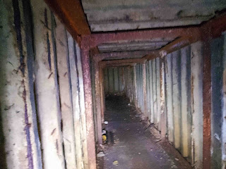 <img src="img_WW 2 air raid shelter in Keighley UK.jpg" alt="Images of secret tunnels">