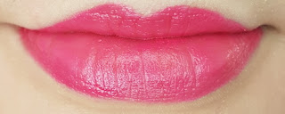 Avon mark. 3D Plumping Lipstick in Pink Pop lip swatch