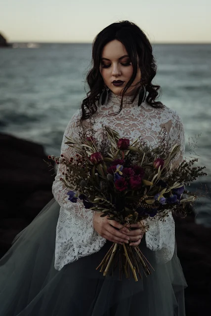 white parrot film and photography beach wedding elopement australian designer dark moody bridal fingal head