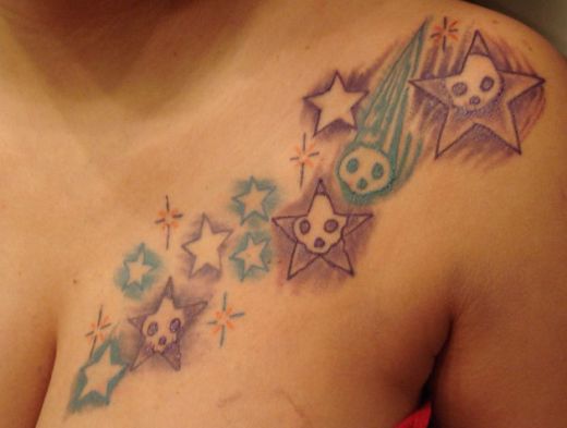 shooting stars tattoos. shooting star tattoo designs.