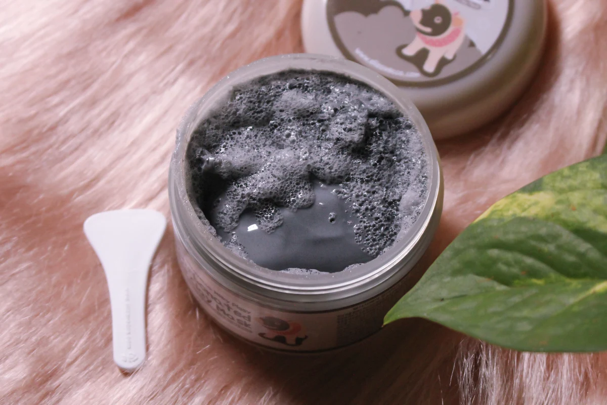 a close-up of an opened pot with Carbonated Bubble Clay Mask by elizavecca