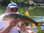 Barbos a mosca con poppers desde Kayak en Picadas