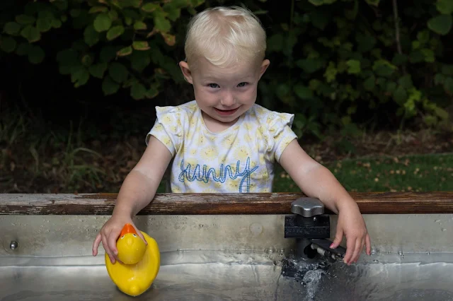 Holding at plastic duck at London WWT centre