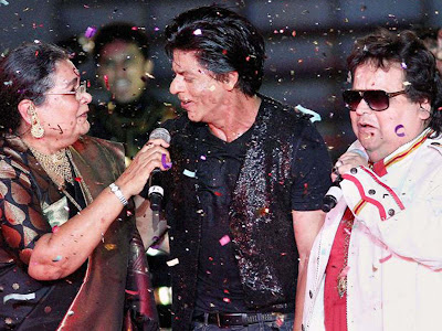 Shah Rukh Khan Bappi lahri performs during the ipl ceremony