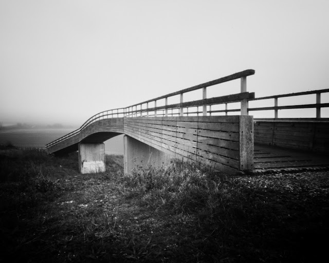 Pinhole photograph of a bridge crossing the road on the South Downs Way trail