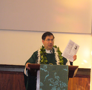 Fr. Pavone with Bulletin