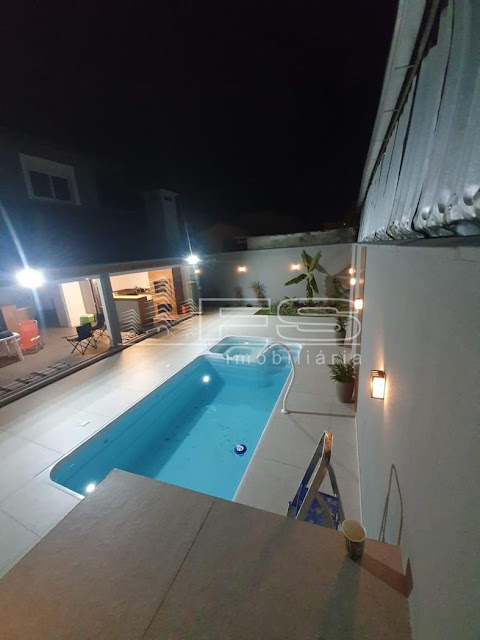Casa com piscina em Pereque, Porto Belo