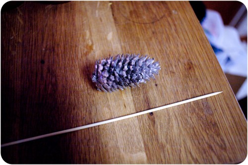 Using the silver spray paint embellish your pine cone as much or as little 