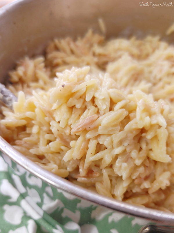 Easy Cheesy Parmesan Orzo! A simple no-fail side dish recipe with orzo pasta cooked in a parmesan cream sauce that comes together in minutes and cooks perfectly every time.