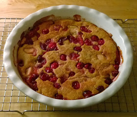 Cranberry, apple and maple pudding cake