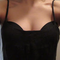 photo showing dress is too low-cut despite description from seller