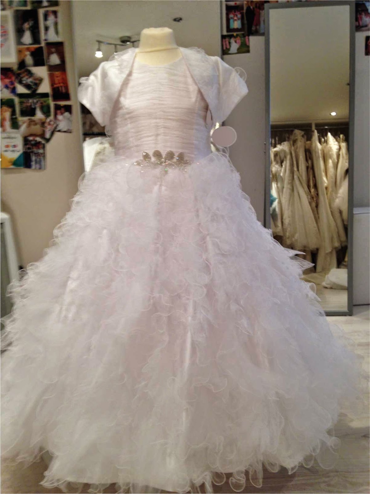 http://www.firstholycommunionday.co.uk/fairytale-princess-communion-dress---maddison---tulle-and-lace-with-ruffle-double-hoop-skirt-17250-p.asp