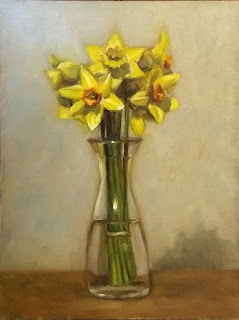 Oil painting of a bunch of daffodils in a 1 litre glass carafe