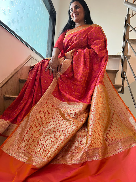 Saffron mushroo silk saree with patola navratan design in the body