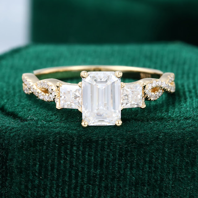 This image has an empty alt attribute; its file name is MollyJewelryUS-Yellow-Gold-Emerald-Moissanite-engagement-ring-1.jpg