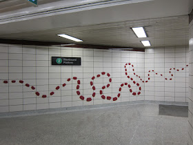 The 'particles' of Ossington Particles lead the viewer on through the station...