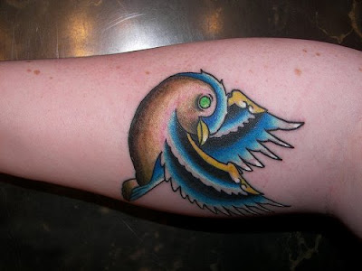 Great looking sparrow tattoo With a hint of gold and blue i love this 
