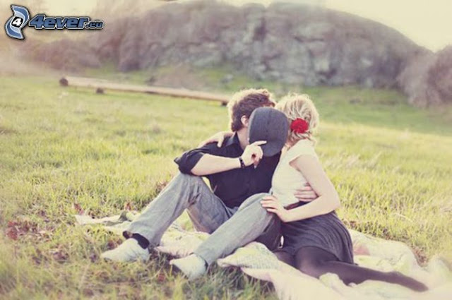 Couples sitting on bench