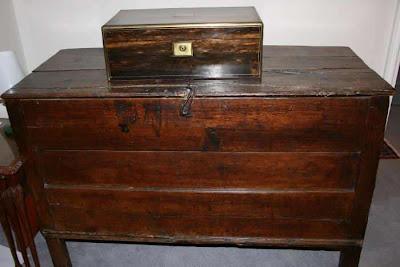 writing box on a wooden chest