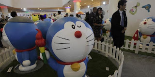 Doraemon Terlahir Berwarna Kuning dan Memiliki Telinga