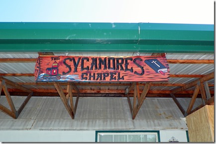 New sign hanging from the porch