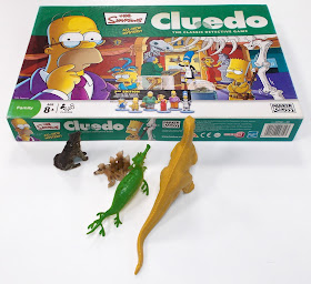 2-6 Players; 3rd Edition; 40766; Age 8+; All-New Mystery; Board Game; Boardgame Pieces; Clue; Cluedo; Family Game; Game; Game On; Game Playing Pieces; Game.com; Original Cluedo; Plastic Figurines; Playing Board; Playing Piece; Simpsons Characters; Small Scale World; smallscaleworld.blogspot.com; The Classic Detective Game; The Simpsons;