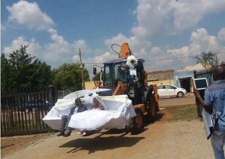 Wow! Couple Arrive Their Wedding Reception in a Tractor (Photos)