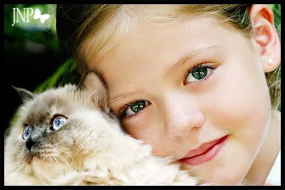 Girl holding a cat