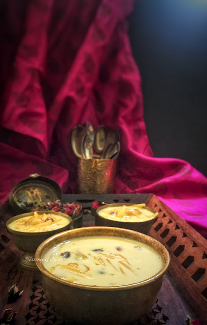 "Bowl of creamy vermicelli and sago payasam garnished with nuts, a traditional South Indian dessert."