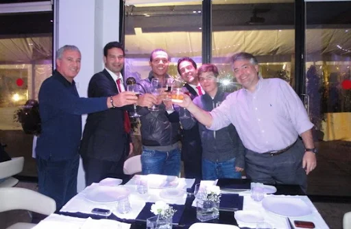 Luís Fabiano poses with São Paulo officials after signing a four-year contract