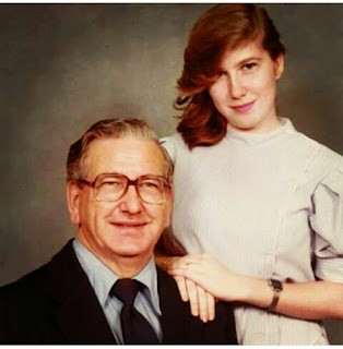 My Daddy and I posing for a formal portrait when I was in high school.