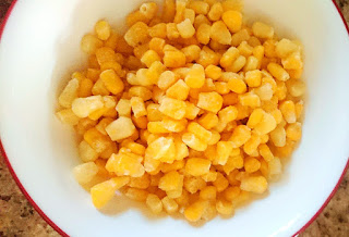 microwaved sweet corn in a bowl