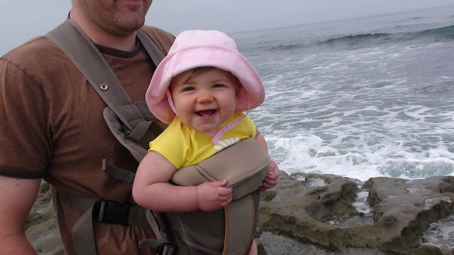 Smiling little girl at the beach