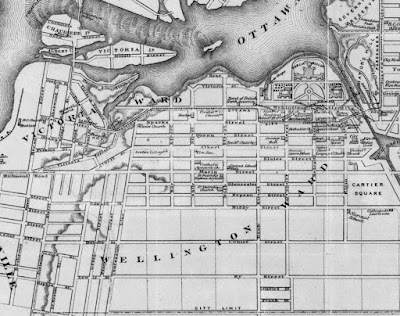 Crop of 1874 map of Ottawa with extents Sussex Street (East), City Limit (Gladstone, South), Rochester/Broad Street (West) and the north edge of Ottawa River (North). Victoria Ward and Wellington Ward are both noted in large print. The city limit runs along what is now Gladstone Avenue in a straight line as far west as Division (Booth) despite the road not continuing west of Concession Line (Bronson), then continues north along Division to Richmond Road (Albert), then goes west out of view. Various prominent buildings (churches, schools, Parliament buildings) are outlined and labelled. Geographic features (islands, hills) are also drawn. Wellington Street runs along the south border of Parliament Hill, between the Rideau Canal and the gorge just east of LeBreton Flats. A hashed line, indicating the streetcar route, begins at the north end of Bridge Street (at the south shore of the Ottawa River), down Bridge, turning southeast at Duke, east at Queen Street, northeast at George Street (Wellington), east on Wellington, south on Bank for one block, east on Sparks Street to and across the Sapper's Bridge over the Rideau Canal, then up Sussex Street off the map. 