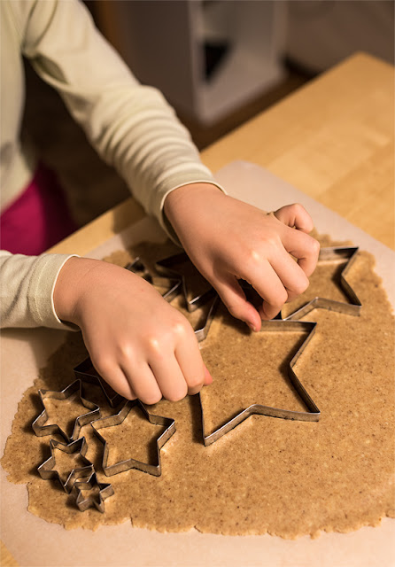 cutting stars from cookie dough