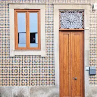 Tall door surrounded by Portuguese tiles in Matosinhos Portugal