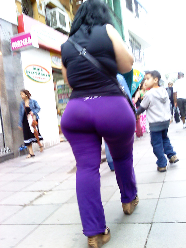 Check out this superb thick booty and thighs in tight purple pants the 