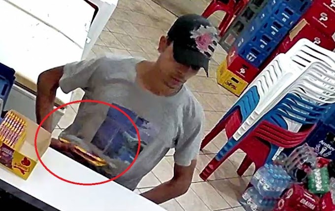  Câmeras flagram jovem furtando barras de chocolate em distribuidora de bebidas