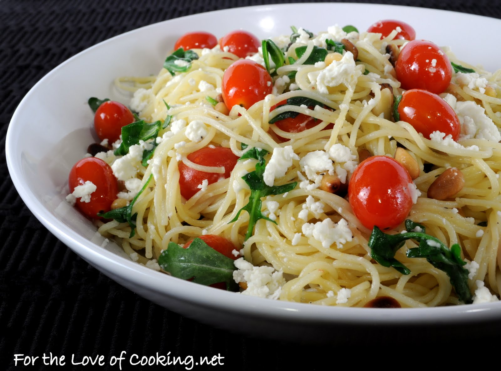 pasta salad with cherry tomatoes and feta cheese