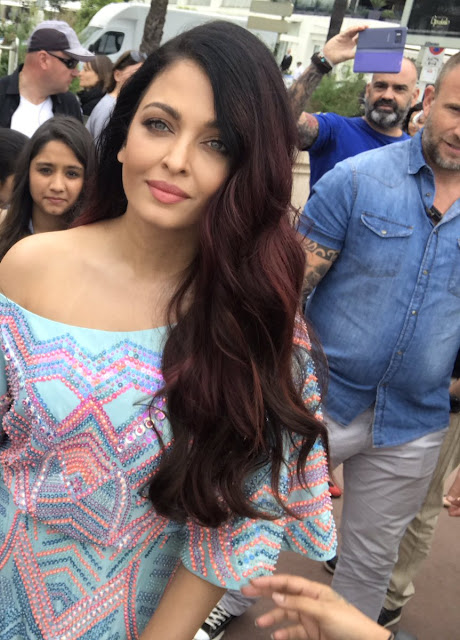 Aishwarya Rai Looks Gorgeous in an aqua blue off-shoulder dress in Makeup Room Lipstick at Cannes Film Festival 2018