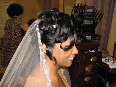 Short wedding hairstyle and birdcage veil with raw silk headband