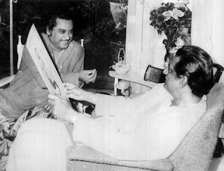 Kishore Kumar is with Satyajit Ray in the picture