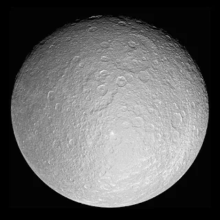 The icy surface of Rhea as photographed by the Cassini spacecraft